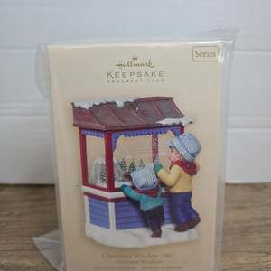 2007 Hallmark Keepsake Ornament titled "Whistle Stop Train Shop"